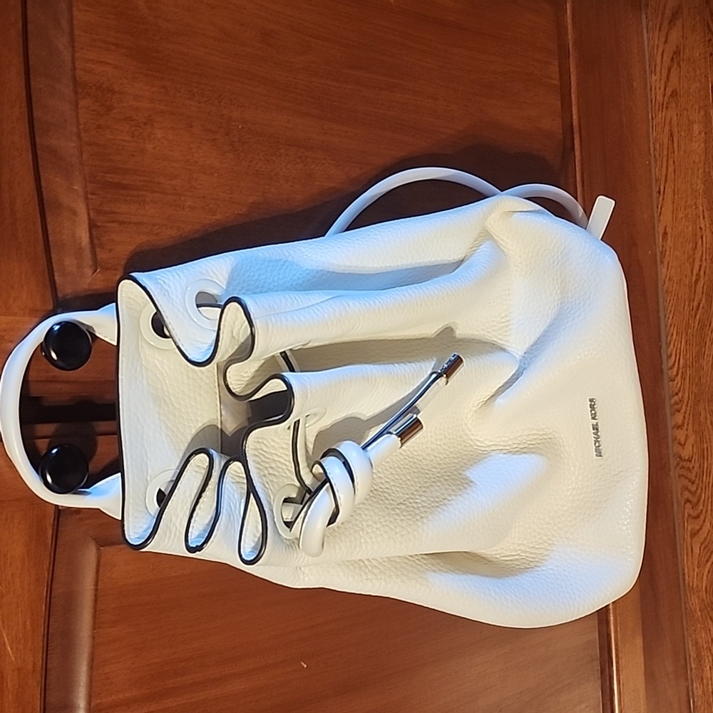 KORS Michael Kors White Pebbled Leather Drawstring Backpack with Black Trim